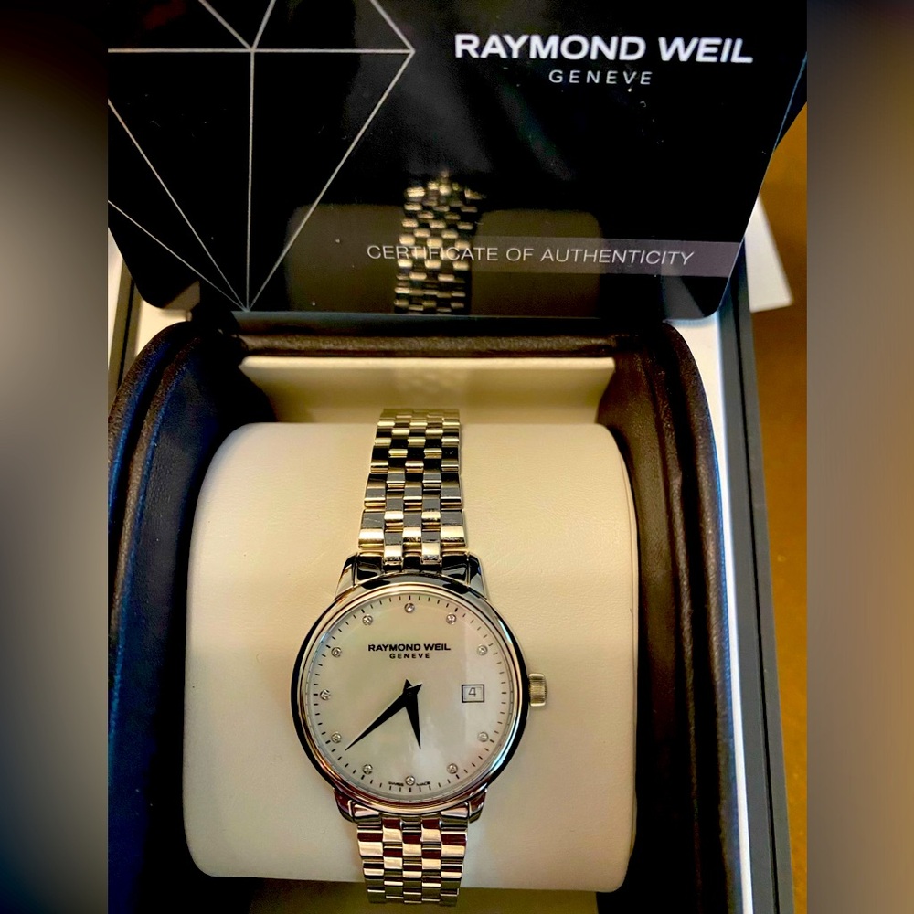 Raymond Weil Geneve Womens diamond wrist watch. New in box, never worn.